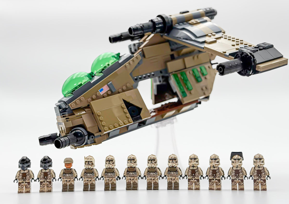 Desert camo Republic gunship in a flight pose above its 12 camo clone troopers