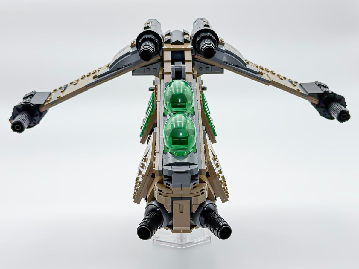Front view of the desert camo Republic gunship with twin green canopies and wing cannons