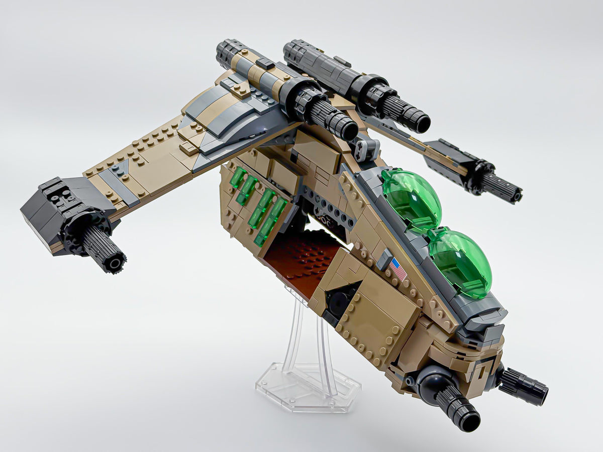 Rear three-quarter view of the desert camo Republic gunship with wing cannons extended