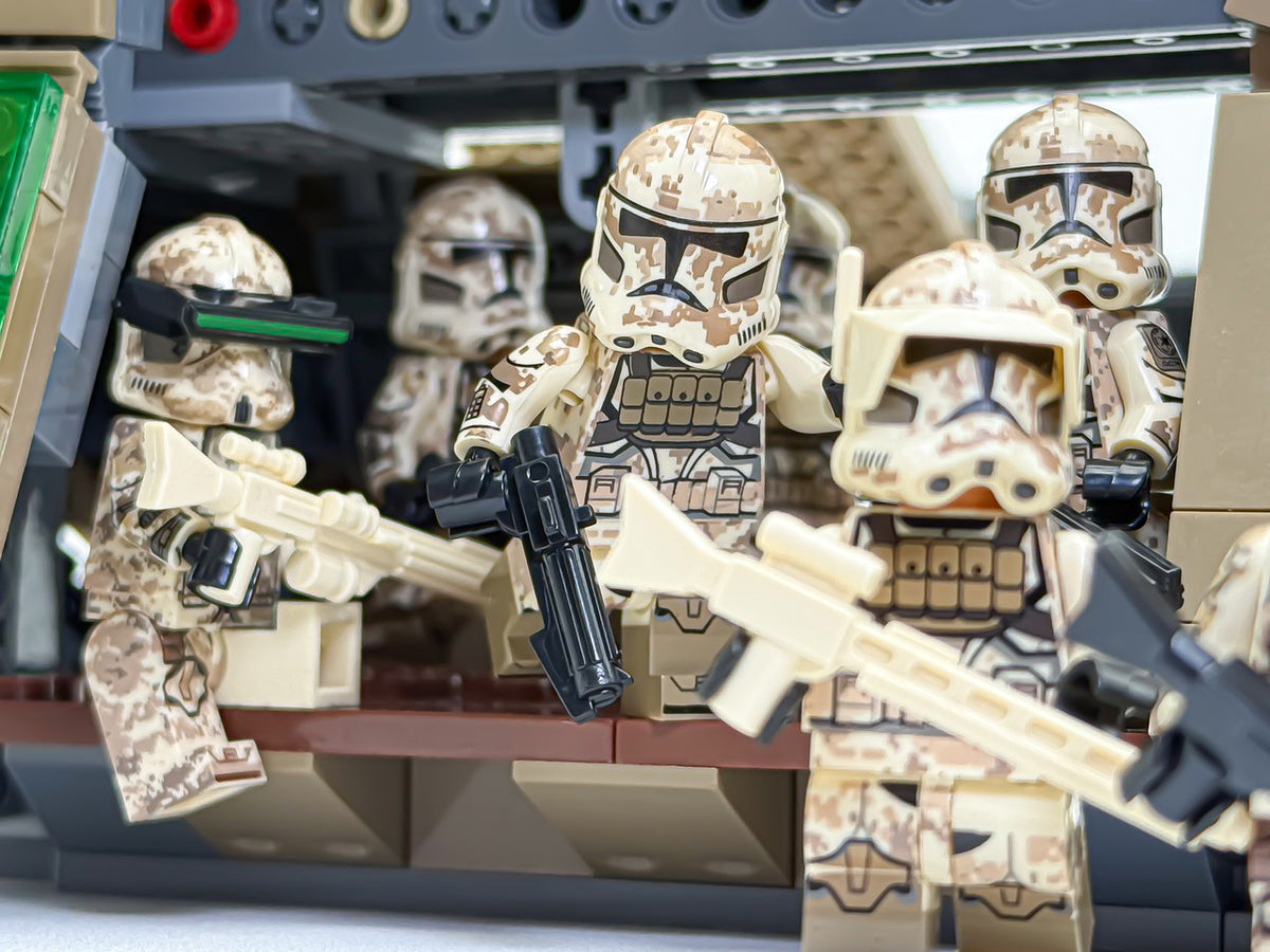 Camo clone troopers loaded in the gunship troop bay with blasters