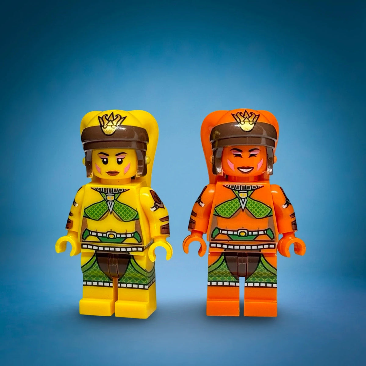 Yellow and orange Twi'lek dancer custom minifigures side by side